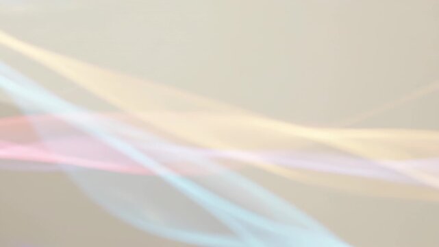 Soft iridescent light waves drifting across warm beige background. Abstract pastel holographic texture, dreamy minimal motion backdrop with elegant copy space