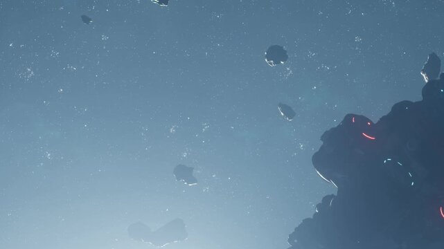 The scene shows various asteroids floating in space. A large object is partially visible on the right side. The background is filled with stars, creating a vast feeling of open space.
