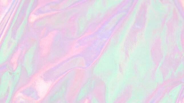 Iridescent holographic foil texture background in pastel pink, mint and lilac colors, abstract gradient surface