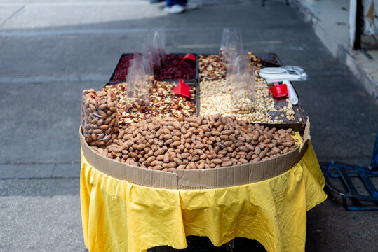 Street Market Stall Selling Assorted Nuts and Dried Fruits