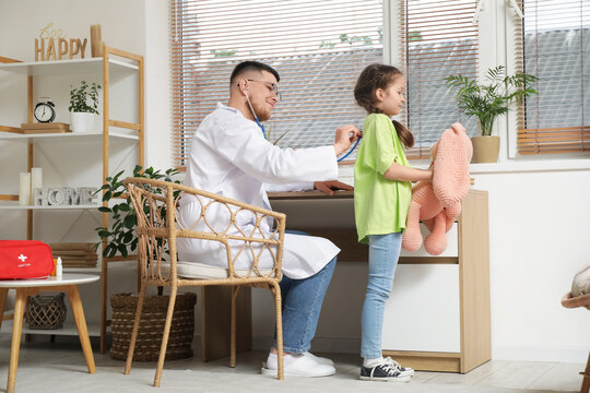 Pediatric healthcare and child wellness, doctor examining young girl with stethoscope during home visit for routine medical checkup in bright room