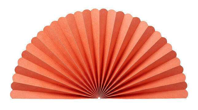 Orange paper fan folded in symmetrical pattern on white background