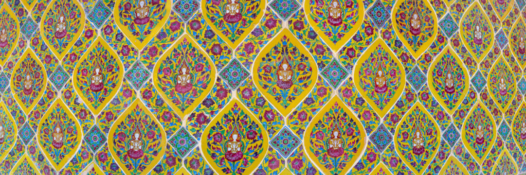 Bencharong ceramic pattern with Devas at Wat Ratchabophit in Bangkok