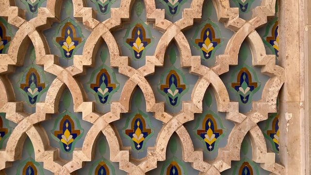 4K Video camera zooms out shot of traditional Zelige mosaic fountain pattern of Morocco, Casablanca mosque Hassan 2	