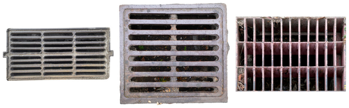 Three weathered metal drain covers or grates, showcasing diverse patterns and textures.