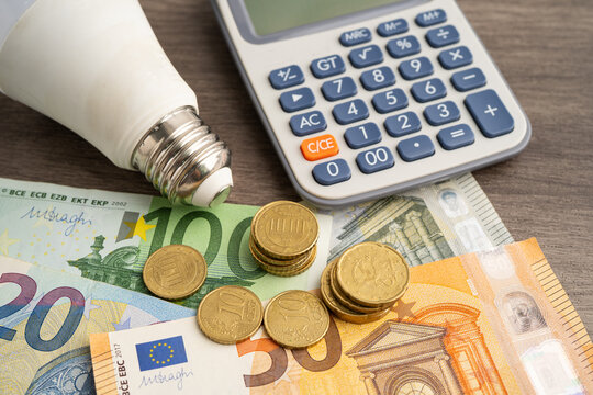 Cost of electric utilities with light bulb for payment.