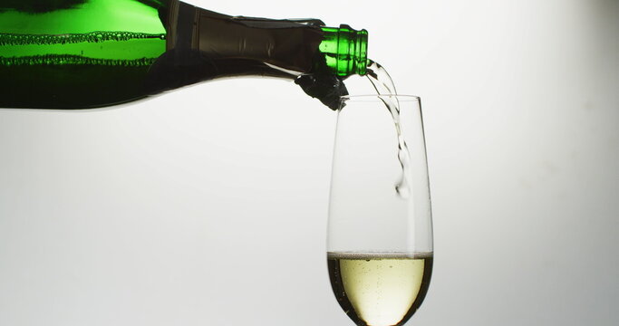 Champagne glass on white background at new year's eve