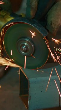 A Close-Up View of Metal Grinding Process, Showcasing Sparks and Tools in Action, Capturing the Precision and Skill of Craftsmanship in Metalworking Tasks