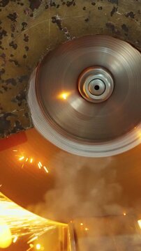 Close-Up of a High-Speed Grinding Wheel Generating Sparks and Smoke During Metalworking Process, Capturing Dynamic Energy and Industrial Precision