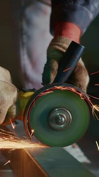 Craftsman Using Grinding Tool to Shape Metal with Precision While Sparks Emanate, Displaying Skills in Metalworking and Fabrication Techniques