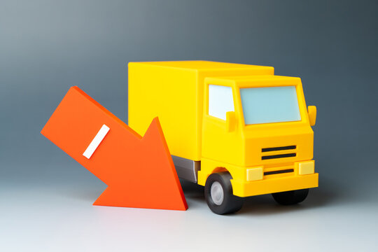 A truck with a falling arrow represents declining freight transport and lower shipping prices. Reduced demand, shrinking revenues and operating pressure challenge trucking and logistics companies.