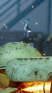 Dynamic Sparks Emanate from Machinery in an Industrial Setting, Capturing the Raw Energy and Motion of Metalworking Operations During a Vibrant Moment