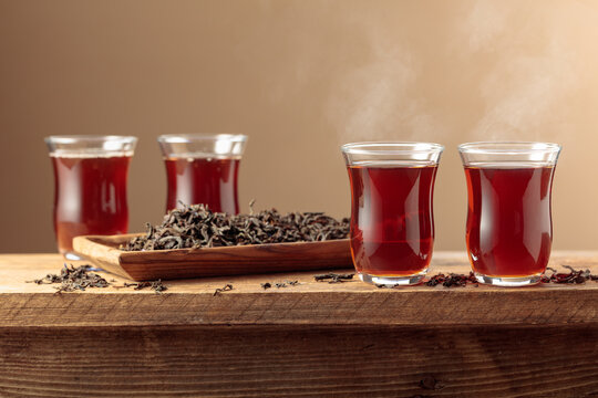 Black tea on an old wooden table.