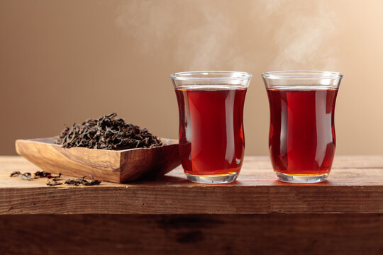 Black tea on an old wooden table.