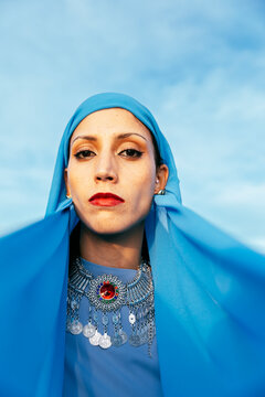 Woman Framed by Blue Scarf