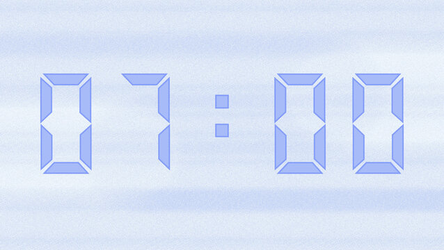 A pastel purple digital clock showing 07:00, set against a blurred pastel purple background.