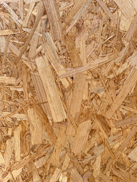 OSB oriented strand board wood texture background close up