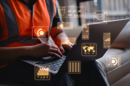 Foreman or woman engineer using computer laptop working at construction site Quality control, maintenance, check in factory, warehouse Workshop for factory operators