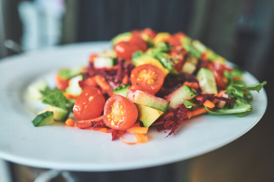 Close-Up of a Chopped Vegetable Salad with Tomatoes and Avocado