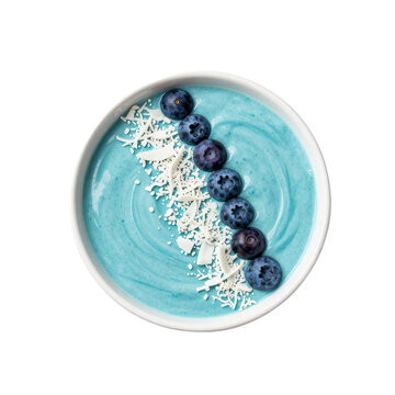 Blue spirulina smoothie bowl with blueberries and coconut flakes
