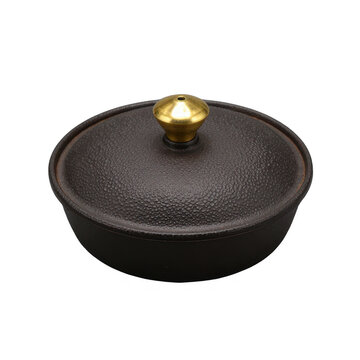 Cast iron pot with lid and brass knob isolated on black