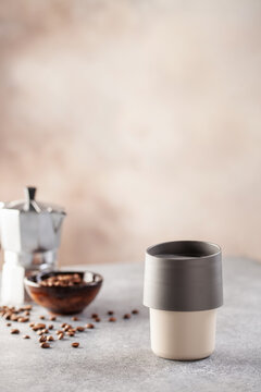 Reusable coffee mug  on a bright background. Healthy break. Reusable ware. Zero waste concept. Copy space