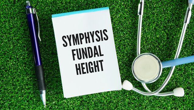 Stethoscope and paper with the words Symphysis-fundal height-SFH-is the distance in centimeters from the top of the pubic bone symphysis pubisl to the highest point of the uterus the-fundus