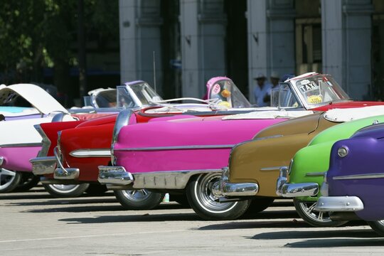 Vintage car, taxis from behind in a row, tail fin, old town, capital Havana, Havana province, Greater Antilles, Caribbean, Cuba