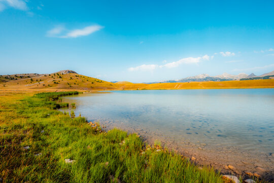 Deep blue waters of Vrazje Jezero (Devil's Lake) on the high plateau of Durmitor National Park, scenic mountain lake landscape in Montenegro.