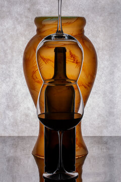 Still life with glass objects on a gray background