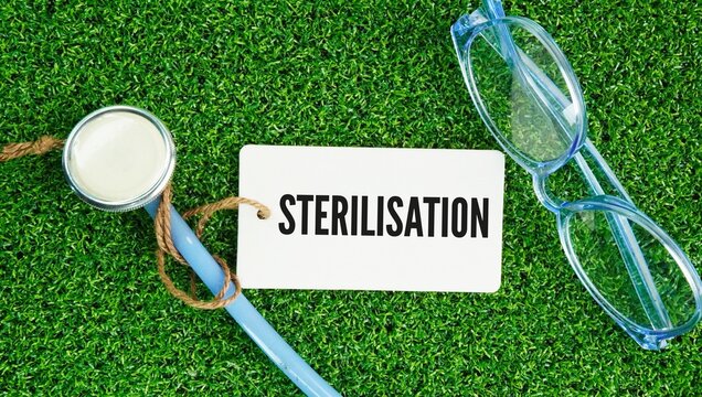 Stethoscope, Pen and paper tag with the word Sterilization has two main definitions: a permanent method of birth control for humans or animals, and a complete scientific process that destroys all form