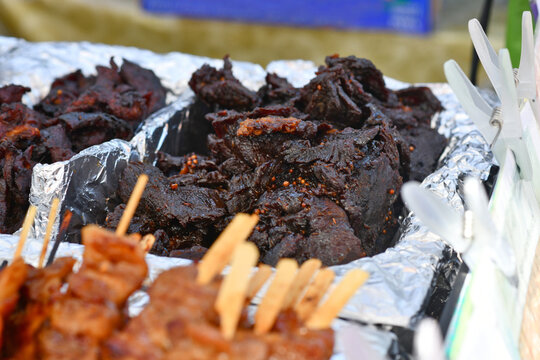 Stir-fried thai beef with black soy sauce in street food market called 'Neua Dad Deow', Thai sun dried beef jerky