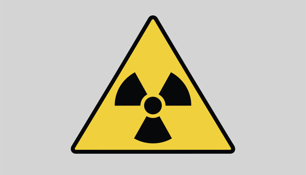 Radioactive hazard ionizing radiation danger warning triangle sign with bold trefoil icon on yellow background.