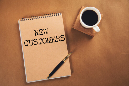 NEW CUSTOMERS text on paper