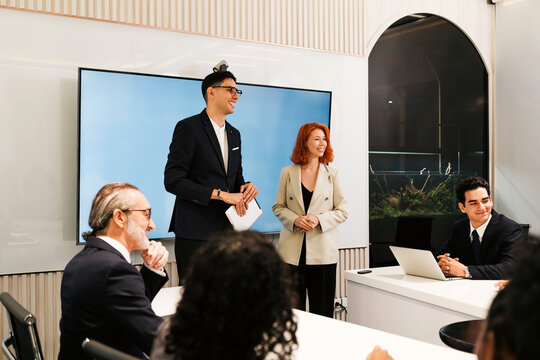 Colleagues present in a modern office meeting room