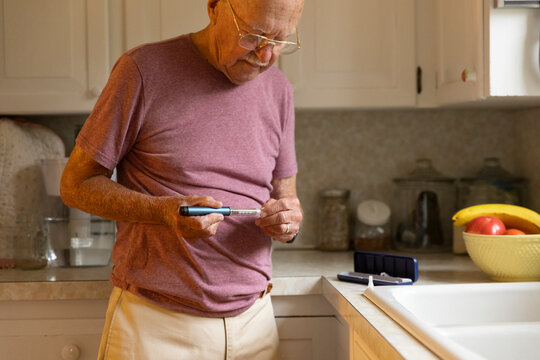 Syringe insulin shot pen diabetic Senior man