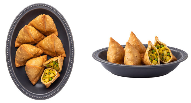 crispy golden indian potato samosas stuffed with spiced peas in a grey bowl