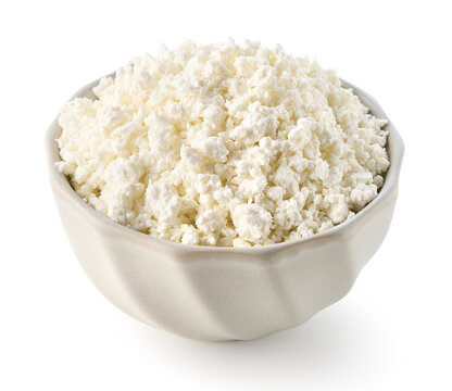 Ceramic bowl of fresh cottage cheese or curd on white background