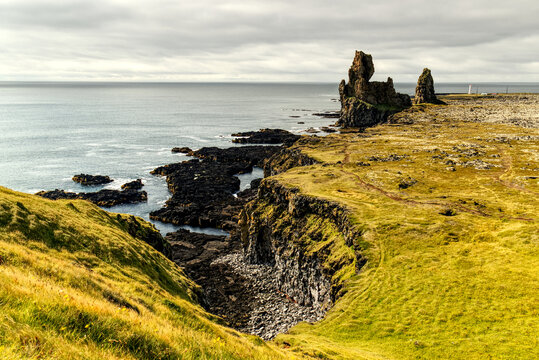 Dramatic coastal landscape of L&oacute;ndrangar sea stacks in Iceland
