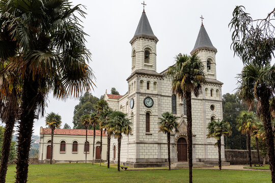 Gardens and fa&ccedil;ade of the Church of Jes&uacute;s Nazareno in the village of El Pito, Cudillero, Principality of Asturias, Spain.