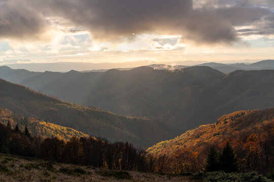 Autumn mountains landscape with dramatic highland low clouds