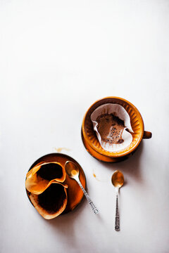 Filter coffee brewing with ceramic dripper and spoons
