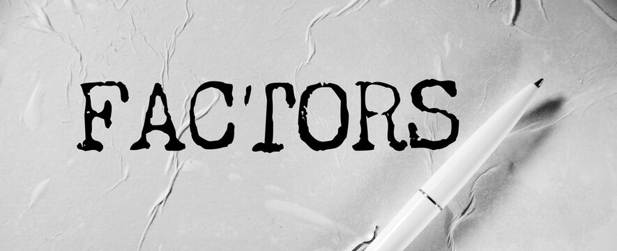 FACTORS word written on paper