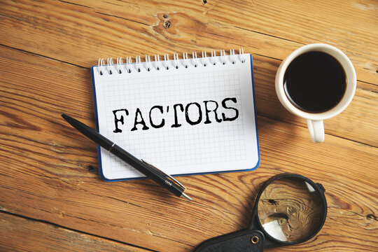 FACTORS word written on paper