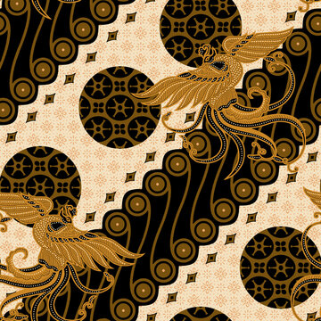 Traditional seamless Indonesian batik pattern with golden phoenix bird parang and kawung motifs