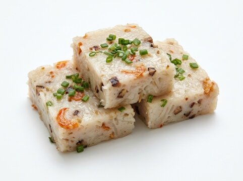 Authentic traditional Chinese Teochew steamed radish cake featuring soft white rice flour and shredded daikon slices with dried shrimp, shiitake mushrooms, and scallions on a white background