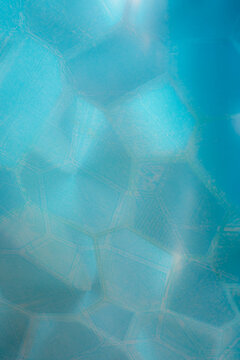 Close-up View of Blue Water Like Patterned by Light in the Background